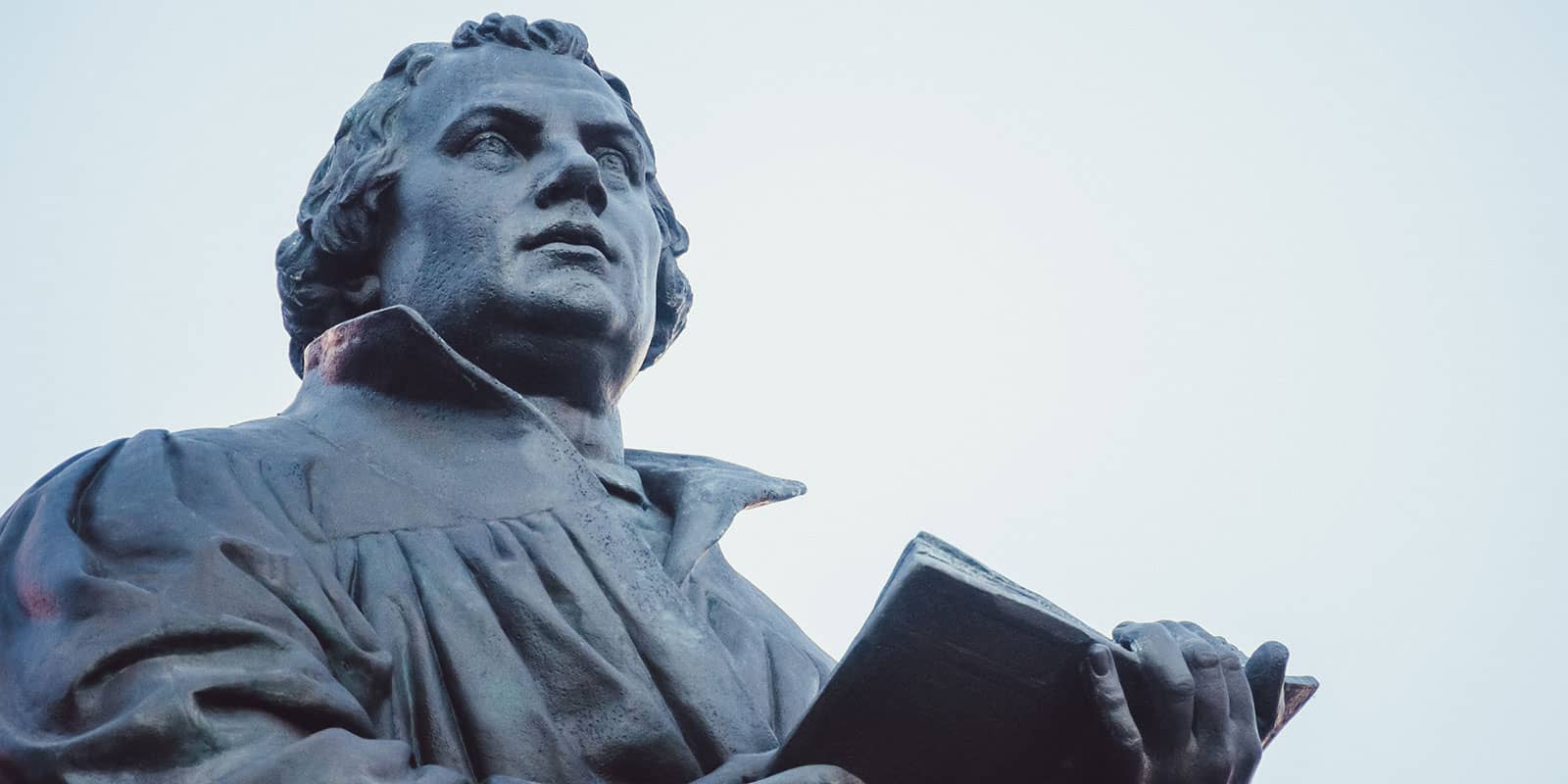 Close up of a stone statue of Martin Luther
